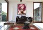 Preview: Stylishes Wohnzimmer. Zur Dekoration hängt ein farbenfrohes Portrait