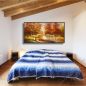 Preview: Ferienwohnung Schlafzimmer. An der Wand hängt ein schönes Landschaftsgemälde Wald mit Fluss