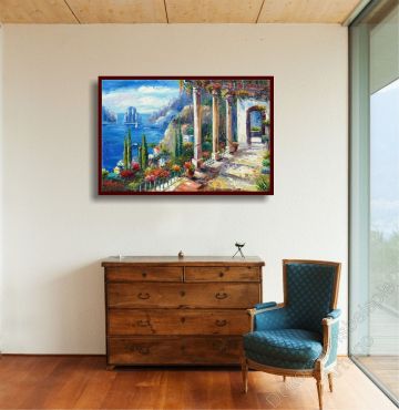Stilmöbel Sessel und Kommode. Zur Dekoration hängt ein Mittelmeer Bild im Rahmen an der Wand