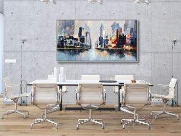 Kühler Kongerenzraum. Über dem Konferenztisch hängt ein Kunstwerk von einer Skyline